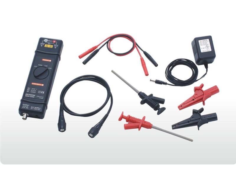 Instek-GDP-025.jpg A collection of electrical tools featuring a multimeter, probe, and cables, arranged neatly on a work surface.