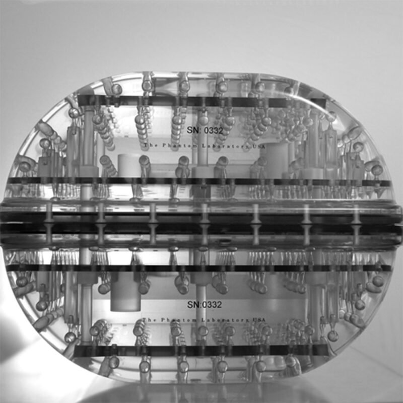 Magphan®-RT-820_b.jpg A black and white photograph showcasing a glass object, highlighting its intricate details and reflections.